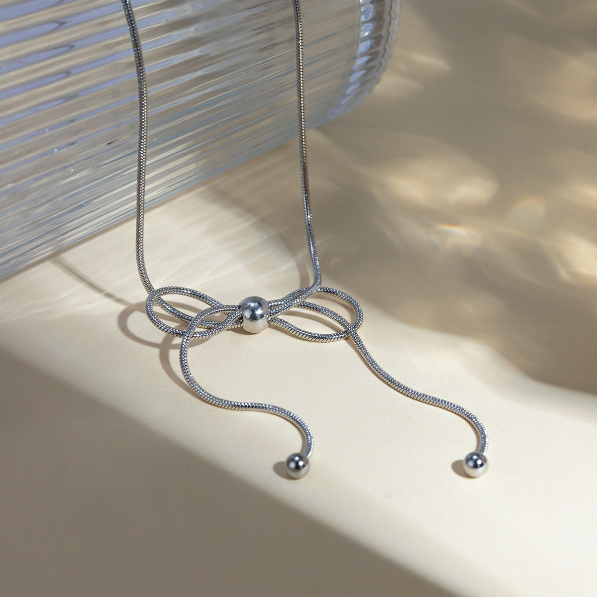 TEEK - Silver Stainless Steel Bow Necklace JEWELRY TEEK Trend   