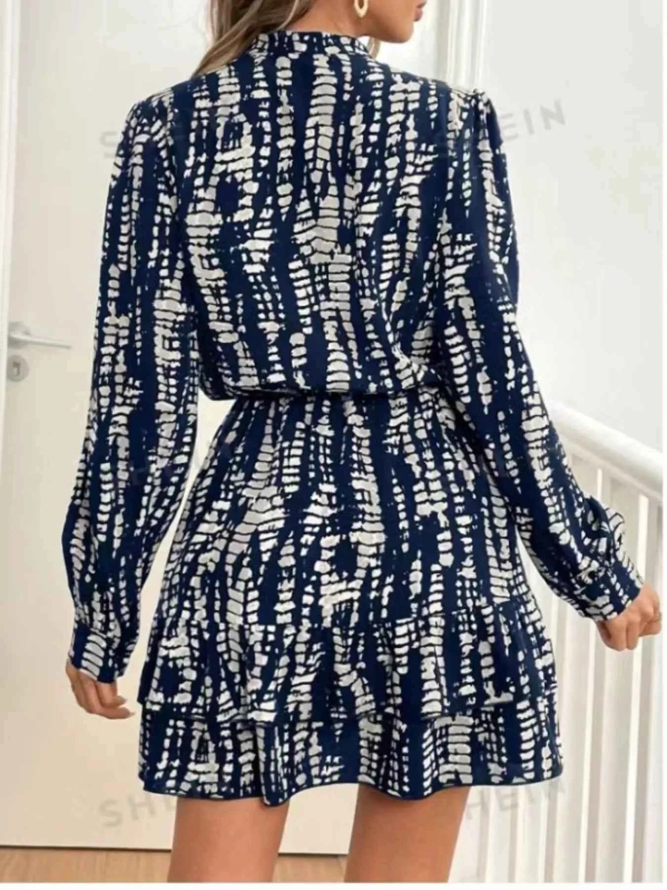 TEEK - Ruffled Hem Long Sleeve Mini Dress DRESS TEEK Trend