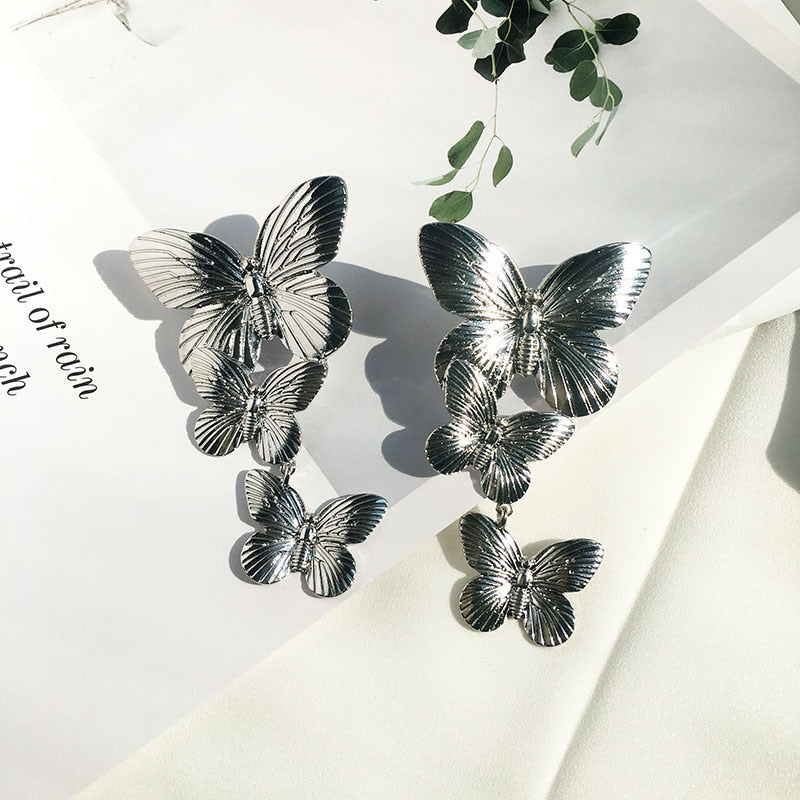 TEEK - Gold Tone Two Butterflies Earrings JEWELRY theteekdotcom Shiny Silver  