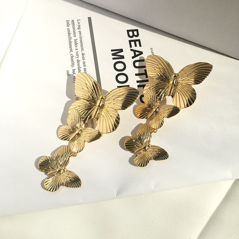 TEEK - Gold Tone Two Butterflies Earrings JEWELRY theteekdotcom Shiny Gold  